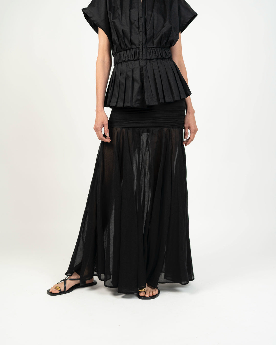 Top Peplum - Vista lateral