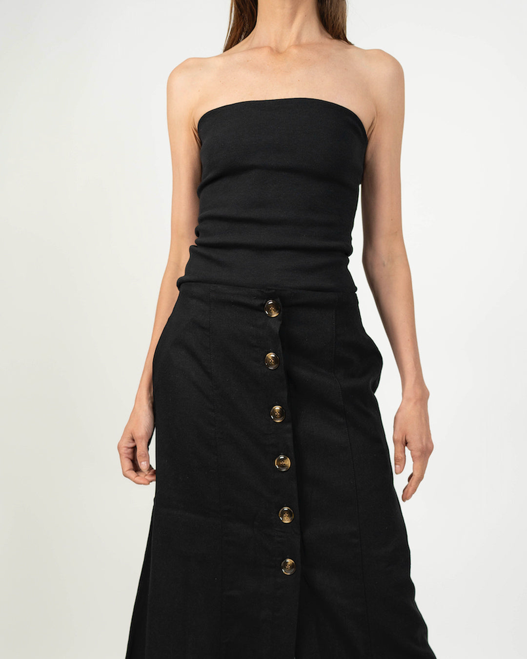 Top strapless básico color Negro - Vista trasera