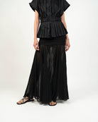 Top Peplum - Vista lateral