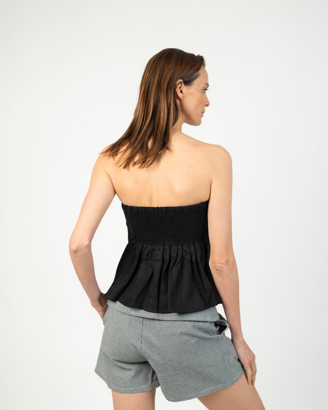 Rounded alaia strapless top - Detalle producto Ochi and Co